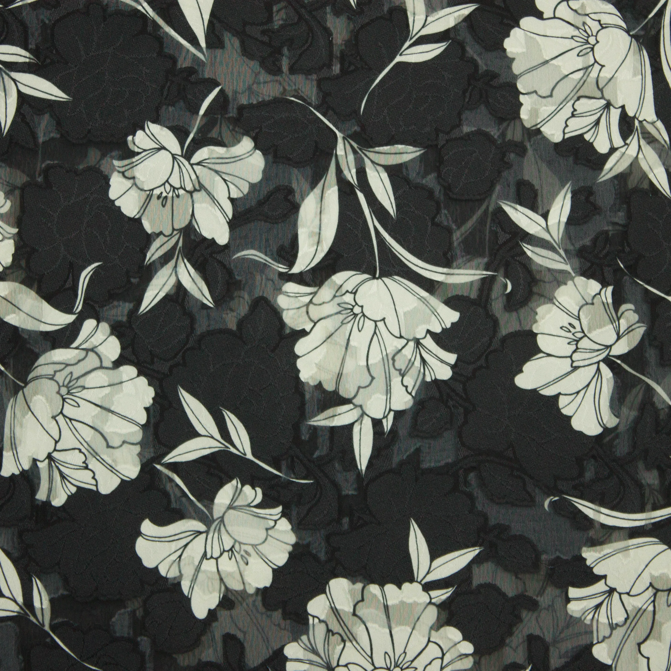 Voile zwart jacquard met witte bloemen